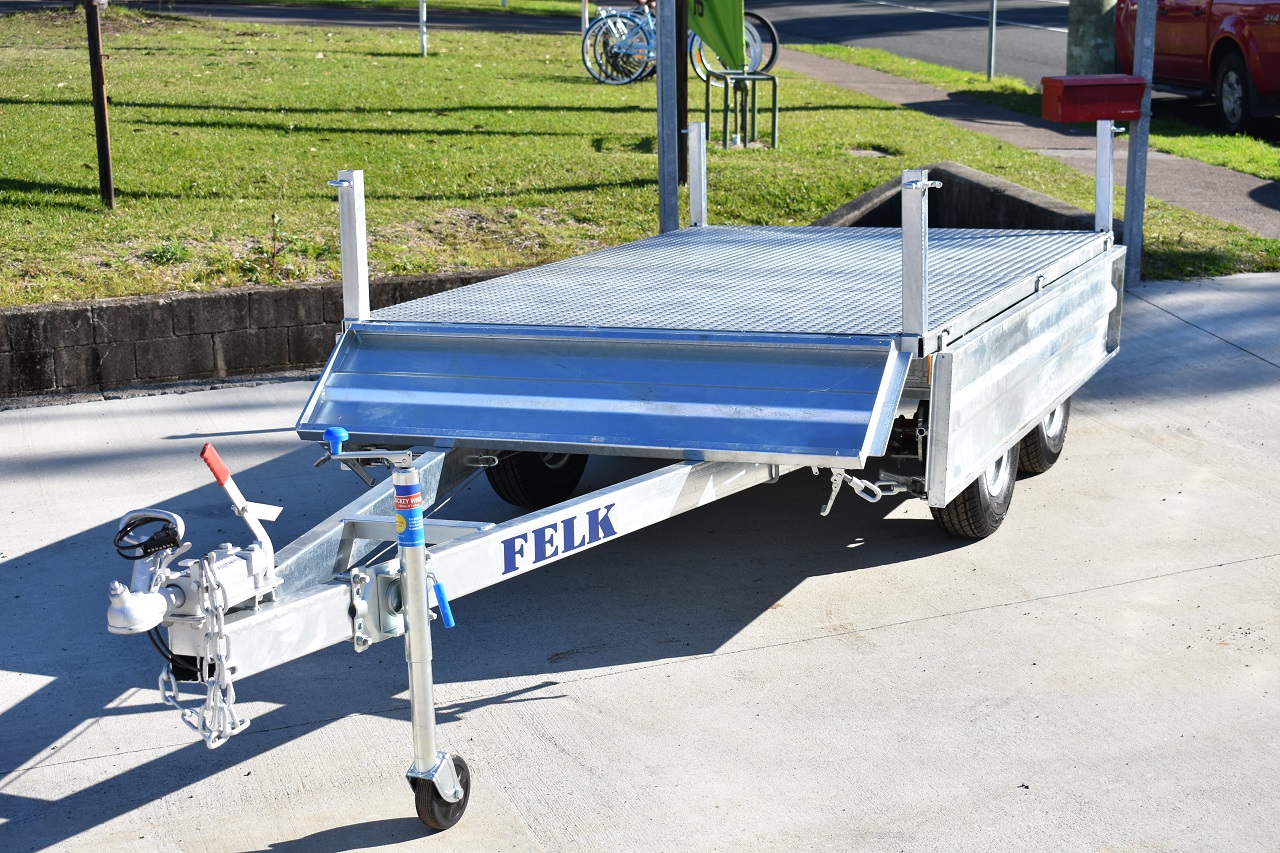 9' by 5' Felk flatbed box trailer with side panels down